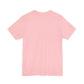 Wrapped in Power Unisex jersey short sleeve tee Printify
